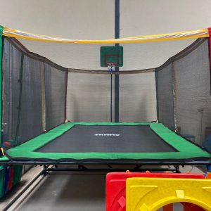 Jumbo Deluxe Trampoline with basketball hoop