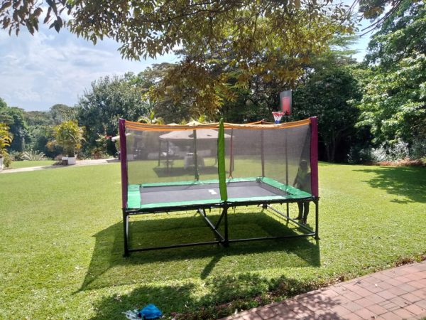 Jumbo Deluxe Trampoline with basketball hoop